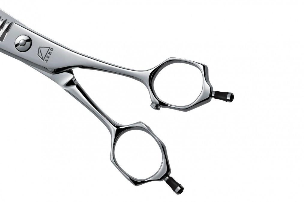Mizutani Acro Yuragi 4 thinning scissors with a smooth silver finish, perfect for achieving soft, blended effects in haircuts without harsh lines.