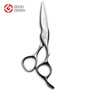 Close-up of Mizutani BLACK-SMITH Fit Puffin scissors in matte black finish, showcasing ergonomic design.
