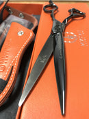 Close-up of Mizutani ACRO Crossover CR-2 scissors in silver, highlighting the advanced Nano Powder Metal for smooth cutting.