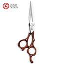 Detailed view of the Mizutani SWORD Wood scissors, highlighting the ergonomic grip and professional-grade cutting edges.